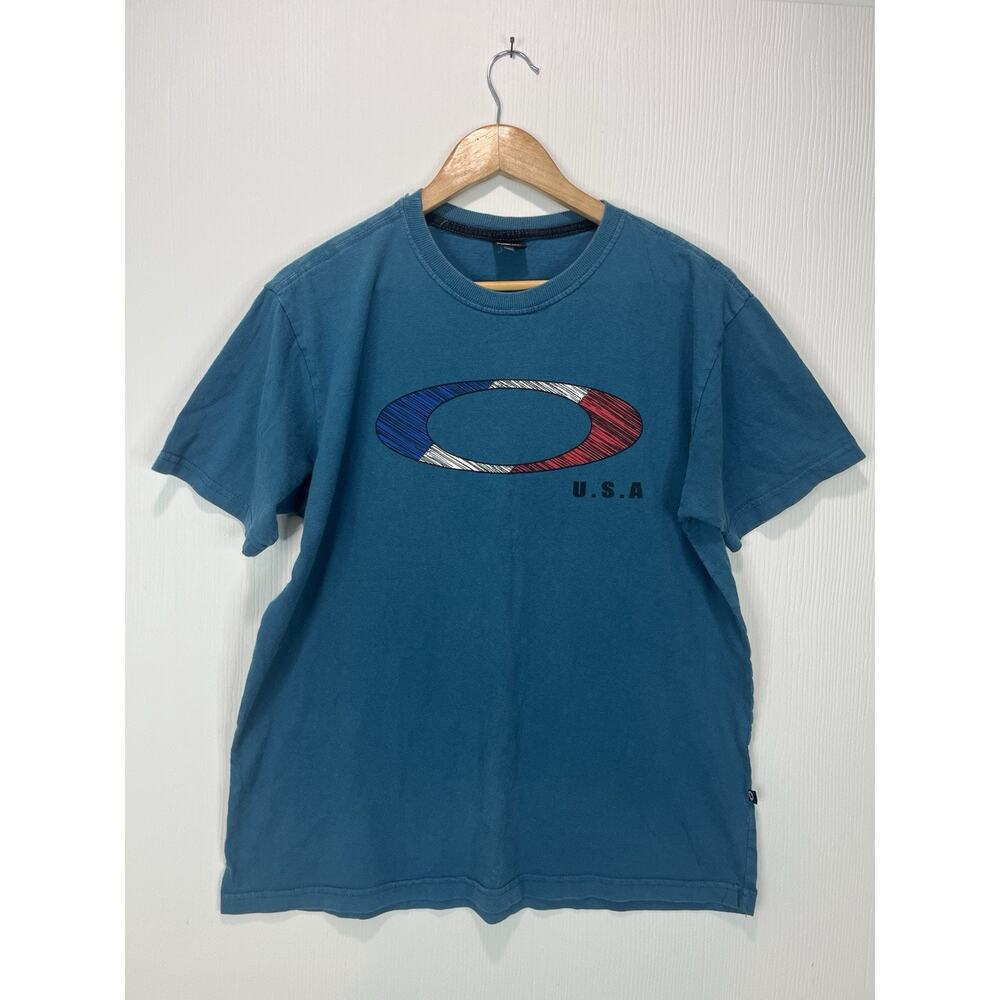 Vintage Oakley Blue Center Logo Flag T Shirt Size Large